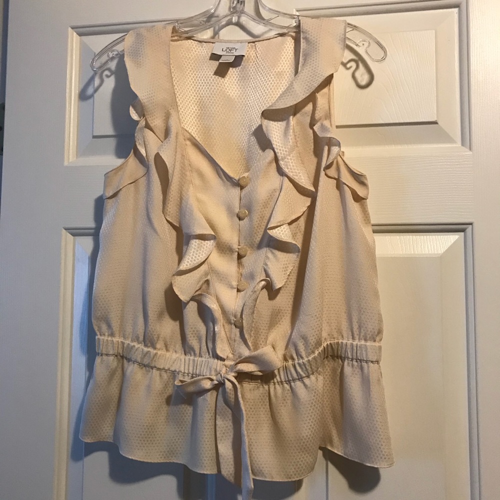 Flirty sleeveless blouse